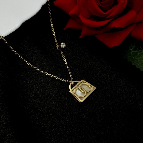 Stainless Steel Bag Shape Inside Moving Cubic zirconia Necklace, Product Code: D-5226